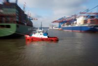 Tugboat Pulling Ship